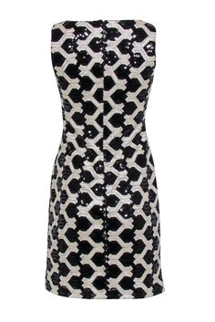 This show-stopping Lauren Ralph Lauren dress demands attention with sparkle and dazzle. From the shimmering sequins, to the black & beige interlocking pattern, this show-stopping sheath silhouette will have you looking like a million bucks. Step up your game with black heels and get ready to make heads turn! Size 2 Shell 100% Polyester Lining 95% Polyester, 5% Elastane Concealed back zipper Interlocking sequin pattern Sleeveless Boat neckline Sheath silhouette Bust 32.5" Waist 29" Shoulder to he Chloe 2024, Interlocking Pattern, Sequin Pattern, Ralph Lauren Dress, Boat Neckline, Black Heels, Lauren Ralph Lauren, Step Up, Sheath Dress