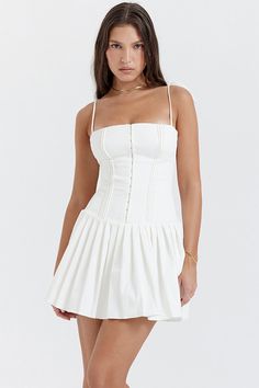 Celebrate the warm and sunny days with the Vacay Sensibility White Pleated Mini Dress! This is ultra feminine dress has the prettiest details like the pin tuck bodice hook and eye detailing to the front and voluminous pleated skirt for pretty movement - highlighting great legs. Hidden back zipper/clasp. 100% Polyester. Lined. Runs true to size. Hand Wash Cold. Do Not Bleach. Line Dry. Iron Low Heat. Origin China. Size Chart (Unit cm) Size Bust Waist Hip Length XS 76-86 56-64 80-90 61 S 80-90 60- Low Waist Dress, White A Line Dress, Stile Preppy, Holiday Dresses Women, Dress Collar, Estilo Preppy, Corset Mini Dress, Pleated Mini Dress, Style Preppy