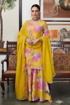 Yellow kurta with floral print and embroidery details. Paired with a printed sharara and dupatta. - Aza Fashions Designer Wear Sharara With Meenakari, Semi-stitched Meenakari Palazzo Set, Unstitched Meenakari Sharara, Chanderi Sets With Meenakari, Yellow Sharara With Meenakari Detailing, Silk Sharara With Meenakari For Diwali, Silk Meenakari Sharara For Diwali, Diwali Silk Sharara With Meenakari Details, Diwali Silk Sharara With Meenakari