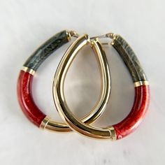 "Large 14K yellow gold oval hoop earrings with vibrant black and red resin. Not your average hoops, large with intact detail.  The backings are in perfect condition, secure and shut tightly. Hallmarked and tested. No issues to note. We are a brick and mortar store located in Alhambra, CA. All items are guaranteed as described.   SPECIFICATIONS: Measurements: 1 1/2\" x 1 1/3\" Width: 5mm Total Weight: 7.49 grams   These earrings have been inspected by professionals with over 35 years of experience to ensure their excellent condition. **Order will ship within 24 hours. We offer a 14-day, no-questions-asked return policy.  Please see detailed pictures, as they are part of the description, and do not hesitate to contact us should you have any questions. Thank you and happy shopping!" Oval Hoop Earrings, Oval Earrings, Oval Earring, Brick And Mortar, Smokey Quartz, Jewelry Earrings Hoops, Gold Black, Etsy Gifts, Etsy Earrings