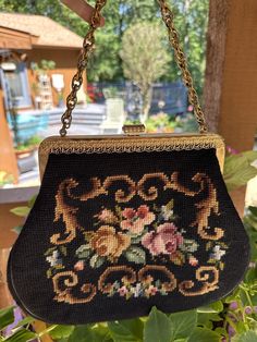 Thank You If You Favored One of My Items! You Will Receive 10% Off an Item of Your Choice, Unless It Is on Sale, CODE17. Thank You 50's HANDMADE NEEDLEPOINT Handbag/Floral Needlepoint Bag/50's Purse/Vintage Purse/Vintage Needlepoint/50's Fashion/Floral Bag/MINT Condition 50's HANDMADE NEEDLEPOINT Handbag You're Currently Viewing a Beautiful Vintage 1950's Handmade Needlepoint Handbag. This Lovely is done with a Black Background and Accented with Roses and Scroll Designs.  The Colors are Pink, Gr 1950s Bags Handbags, Needlepoint Bags Purses, Vintage Evening Bag For Vintage Events, Retro Embroidered Evening Bags, Vintage Rectangular Bags For Luncheon, Vintage Rectangular Evening Bag, Vintage Embroidered Rectangular Evening Bag, Vintage Embroidered Formal Bags, Vintage Embroidered Evening Bags