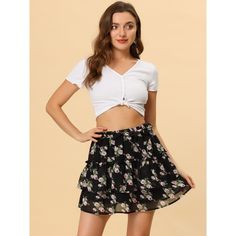 Simple and cute, this skirt is complete with a floral print, a layered ruffle hem, and an elastic high waist. Enchanting blooms sweeten this mini skirt. A romantic look in spring and a fresh look in summer. Add a completely cute and unique vibe to your look with this floral mini-skirt. This skirt is suitable for going to the beach, which is unique and cool, and is able to attract people’s attention. Perfect to pair it with sandals or high heels for a sweet look. Attract People, Mini Skirt Black, Floral Mini Skirt, Romantic Look, Women's Skirts, Skirt Black, Ruffle Hem, Mini Skirt, Elastic Waist