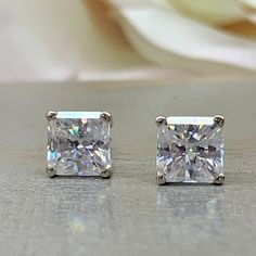 Moissanite Diamond Stud Earrings Unisex 14K Solid White Gold, Moissanite Earrings Radiant Cut 2.00 CTW, Moissanite Stud Earrings Women #7192 #MoissaniteEarrings #DiamondStuds #MoissaniteEarring #Moissanites #RadiantCut #WomensEarrings #WhiteGold #StudEarrings #14kSolid #EarringsUnisex Princess Cut Sterling Silver Earrings, Diamond White Radiant Cut Cubic Zirconia Earrings, Sterling Silver Princess Cut Earrings With Vvs Clarity, Radiant Cut Cubic Zirconia Diamond Cut Earrings, Fine Jewelry Radiant Cut Earrings Gift, Radiant Cut Cubic Zirconia Earrings Fine Jewelry, Princess Cut Cubic Zirconia Earrings With Diamond Cut, White Princess Cut Earrings For Anniversary, Classic White Princess Cut Earrings