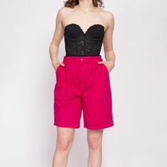 Vintage 90s high waisted hot magenta pink cotton shorts with pleating at the front.  Measurements and Condition: Fits like: Labeled 12 jr, fits modern women's medium Fabric: Cotton denim Brand: Duck Head, made in USA Condition: Good, with a 3/4" spot where the fabric has discolored to a reddish color on the front right of the waistband, and some similar spots throughout the fronts of the legs (see close up example photos - not super noticeable when worn due to the vibrant color of the shorts). W Pink Pleated Shorts, Pink Stretch Shorts Mid-thigh Length, Hot Pink Denim Shorts, Pink Stretch High-waisted Shorts, Pink Moisture-wicking High-waisted Shorts, Denim Mom Shorts, Duck Head, Magenta Pink, Mom Shorts