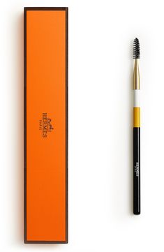 What it is: A brush designed to be used before makeup to separate the lashes and shape and define the brow line. What it does: Generous and extremely soft, this precious object with a three-colored handle in lacquered wood sits comfortably in the hand. Designed by Pierre Hardy, each Hermès Beauty brush comes in one of the House's signature orange boxes. They now form their own collection, known as Les Pinceaux Hermès. Hermes Makeup, Dream Products, Makeup Packaging, Bella Beauty, Makeup Package, Beauty Brushes, Orange Boxes, Face Beauty, Lacquered Wood