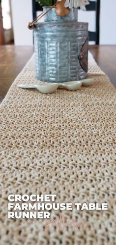 a close up of a table runner with flowers in a vase on the top and text overlay reading crochet farmhouse table runner