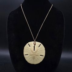 This vintage sand dollar necklace features a 2.5" D sand dollar on a 25" L gold tone chain. Summer Costume, Sand Dollar Necklace, Sand Dollar Pendant, Beachy Summer, Sand Dollar, Kingston, Costume Jewelry, Jewelry Necklace Pendant, Gold Tones