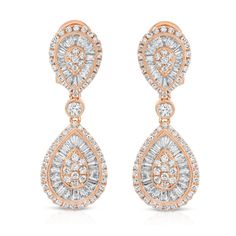 14 Karat Rose Gold Baguette Earrings. Diamond weight 2.50 ct. Channel Set baguette diamonds and bezel set round diamond in the center of the earrings. Earrings have a matching pendant. Matching Pendant #5326 Luxury Rose Gold Baguette Cut Earrings, Anniversary Baguette Diamond Drop Earrings, Rose Gold Baguette Cut Earrings For Formal Events, Rose Gold Baguette Cut Earrings For Formal Occasions, Luxury Rose Gold Earrings With Baguette Diamonds, Formal Rose Gold Baguette Cut Earrings, Rose Gold Baguette Diamond Earrings For Formal Events, Rose Gold Baguette Cut Earrings For Anniversary, Luxury Rose Gold Baguette Diamond Earrings