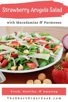 strawberry arugula salad with macadannas and parmesan on the side