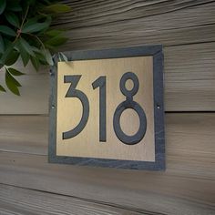 The Finishing Touch for your Home, Cottage, or Bungalow! This home address plaque customized with your house numbers is made of the highest quality Slate, Cast Stone and Rust Resistant Composite Metals. SPECIFICATIONS: Plaque Size - Roughly 12"x12" Number Size - 7" tall  Plaque Material - natural quarried Black (Dark Gray veining, slight color variations in stone may occur) Engraving Material - a composite with metallic finish that is rust resistance and made for exterior use Your Choice of: Copper on Slate  Bronze on Slate (shown)  Platinum on Slate  WANT TO GIVE A PERSONALIZED SIGN AS A GIFT? If we can't have it delivered in time, simply make your purchase and mark it as a gift, print out a picture of the item on some nice paper and wrap it up in a pretty box or put it into a card saying Slate House Numbers, House Number Plate, House Number Plaque, Modern Craftsman, Home Cottage, Card Sayings, Craftsman Home, Craftsmen Homes, Cast Stone