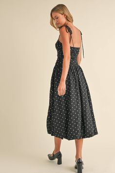 Indulge in elegance with our Ruched Drop Waist Dress. Featuring a sophisticated polka dot print and a flattering ruched drop waist, this midi bubble dress will make a statement at any event. The delicate spaghetti straps can be tied for a personalized fit. Elevate your wardrobe with this exclusive piece. 95% POLYESTER 5% SPANDEX Drop Waist Dress, Fall Transition, Bubble Dress, Fall Accessories, Dropwaist Dress, Romper With Skirt, Polka Dot Print, Waist Dress, Drop Waist