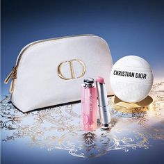 Holiday Limited Edition Dior Beauty & Care Set. The 3-Piece Set Includes: - Dior Addict Lip Glow, 3,2 G. The Dior Lip Balm That Reveals The Natural Color Of The Lips While Hydrating Them. In This Set, Discover It In Shade 001 Pink, A Light Pink. - Dior, The Balm, 1.6 Oz. A Multi-Use Revitalizing Balm For The Hands, Lips And Body. Its Tube Wrapped In The Dior Oblique Logo And Its Ergonomic Shape Make It As Much A Skincare Product As A Couture Accessory. -Dior Holiday Edition Cosmetic Bag Dior Pouch, Dior Lipgloss, Dior Skincare, Fake Makeup, Dior Addict Lip Glow, Dior Lip Glow, Dior Addict Lip, Rituals Set, Hydrating Lip Balm