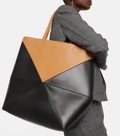 Puzzle Fold Large Leather Tote Bag in Multicoloured - Loewe | Mytheresa Modern Geometric Leather Bags, Chic Geometric Leather Bag, Geometric Leather Travel Shoulder Bag, Geometric Leather Shoulder Bag For Travel, Geometric Leather Travel Bag, Elegant Geometric Leather Bags, Loewe Puzzle, Large Leather Tote Bag, Folding Bag