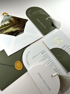 an assortment of wedding stationery and envelopes