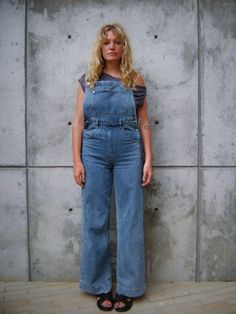 Featuring a bib front with a patch pocket, this denim overall is a take on a classic, with adjustable straps, an open back, and wide legs for a relaxed fit. Adjustable straps Wide leg opening Patch bib pocket Open back Back patch pockets Inseam: 33 ¼” 100% Cotton Machine wash with like colors. Do not bleach. Tumble dry low. Iron cool. Do not dry clean. Back Back, Bib Overalls, Low Iron, Wide Legs, Back Patch, Wide Leg Denim, Accessories Necklace, Sales Gifts, Dress Accessories