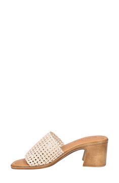 A woven upper creates a boho aesthetic on a slide sandal balanced by a round toe and chunky block heel. 2 1/4" heel Synthetic and textile upper and lining/synthetic sole Imported Summer Sandals With Open Weave, Spring Woven Leather Mules With Block Heel, Casual Woven Heels With Block Heel, Casual Woven Block Heel Heels, Casual Open Toe Woven Leather Clogs, Synthetic Mules With Woven Sole And Block Heel, Casual Woven Heels, Casual Sandals With Woven Leather And Block Heel, Natural Sandals With Woven Sole And Block Heel