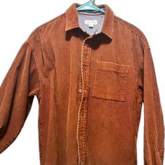 Casual Shirt With Corduroy Collar, Casual Corduroy Button-up Shirt, Casual Corduroy Shirt With Button Closure, Fall Corduroy Shirt With Buttons, Casual Brown Tops With Corduroy Collar, Orange Button-up Shirt With Pockets, Brown Button-up Shirt With Corduroy Collar, Brown Corduroy Collar Button-up Top, Brown Button-up Tops With Corduroy Collar