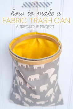 a fabric trash can is shown with the title how to make a fabric trash can