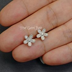 "Thank you for coming in! Extraordinary 14K solid white gold diamond flower Ear posts with backs! 0.15 carat total diamond weight,high quality F-G color, VS-SI clarity. It looks much much nicer in person! It is stamped with \"14k\" which is shown on the back. You'll get one pair per winning! SIZE: 8.6mm Weight: 1.45 gram (approx) MATERIAL: 14k Solid white gold, Diamond" Flower Shaped Diamond Earrings With Single Cut Diamonds, Flower-shaped Diamond Earrings With Single Cut Diamonds, Diamond White Flower-shaped Diamond Earrings, Flower-shaped Brilliant Cut Diamond Earrings, Flower Shaped Diamond White Earrings With Brilliant Cut, Diamond White Flower Shaped Earrings With Brilliant Cut, White Diamond Flower Earrings For Anniversary, Diamond White Flower Shaped Brilliant Cut Diamond Earrings, Diamond White Flower-shaped Brilliant Cut Earrings