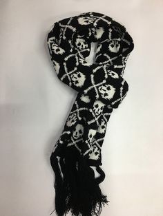 Scare away the cold with this Punk Skull Scarf! Take on the chill with fearless style. This Punk Skull Scarf will keep you warm and add a daring edge to any outfit! Scarf Size: Length: 180cm including Tassels, Width: 15cm Description: Scarf Type: Scarf, ShawlScarf Length: >175cmProcess: KnittedPattern Type: GeometricOrigin: CNMaterial: AcrylicItem Type: Scarves Crochet Scarf Skull, Yana Core, Goth Scarf, Grunge Scarf, Hellenic Polytheism, Cool Scarf, Cute Scarves, Funky Scarves, Scarf Aesthetic