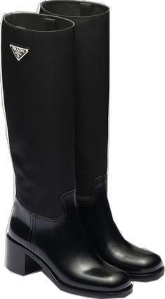 Classic Black Calf Leather Platform Boots, Classic Black Mid-calf Calf Leather Boots, Classic Black Mid-calf Boots In Calf Leather, Classic Black Calf Leather Knee-high Boots, Classic Black Mid-calf Boots With Leather Lining, Classic Black Boots With Padded Heel, Designer Boots With Pointed Toe And Rubber Heel Cap, Designer Black Calf Leather Knee-high Boots, Classic Black Mid-calf Boots With Reinforced Heel