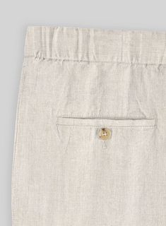 Step up in the sartorial game with our Easy Pants Pure Barn Beige Linen. Crafted from pure linen, the pants will carry you through the hot summer days and crisp evenings with grace, poise, and flair. Add a matching waistcoat and jacket, a white shirt and black shoes for stylish outfit.  Look Includes   Pure Barn Beige Linen Fabric  Elastic Waistband  Zip fly With Button Closure   Internal Drawstring   Two Welted Back Pockets   Click 'Customize Now' to modify the look if needed.  Lining: Viscose; Classic Linen Bottoms For Daywear, Classic Linen Flax-colored Bottoms, Classic Flax Linen Bottoms, Classic Linen Bottoms In Flax Color, Classic Flax Pants For Summer, Formal Linen Bottoms For Summer, Formal Linen Summer Bottoms, Tailored Linen Pants With Pockets, Classic Beige Pants For Summer