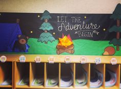 there is a sign that says let the adventure begin and some shoes are on the shelf