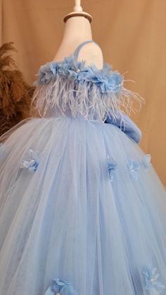 A blue flower girl dress is a charming and elegant garment designed for girls to wear as part of a party.  ⭐️⭐️⭐️⭐️⭐️ Typically crafted from soft fabrics like crepe, tulle, this dress features a beautiful blue color that adds a touch of sophistication to the occasion ⭐️⭐️⭐️⭐️⭐️  The design often includes delicate floral accents, such as embroidered flowers or appliqués, which enhance its visual appeal. ⭐️⭐️⭐️⭐️⭐️ item details * One dress, hair accessory * Material: crepe, tulle  * Sizes of flowers: 5 cm ✈️ Shipment and delivery ⭐️⭐️⭐️⭐️⭐️ Best customer service on Etsy 🚀🚀 Shipment in 10-15 workdays after payment. 🚀🚀 Worldwide express shipping ( Fedex Shipping ) 1-5 workdays. EVERYTHING IS FOR  Please visit my store for my other models. https://www.etsy.com/shop/SevgiDesigner HOW TO ORDE Elegant Blue First Communion Dress, Elegant Blue Dress For First Communion, Blue Princess Dress For First Communion, Elegant Light Blue Gown For Dress-up, Elegant Blue Ball Gown For Dress-up, Blue Tulle Ball Gown Pageant Dress, Elegant Blue Princess Dress For Baptism, Blue Tulle Princess Dress For Pageant, Blue Tulle Princess Dress For Wedding