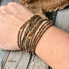 Olive Wrap Bracelet or Necklace on Stretch Cord - Etsy Adjustable Beaded Copper Bracelets, Beaded Bronze Copper Bracelets, Bronze Beaded Copper Bracelets, Bohemian Gold Beaded Copper Bracelets, Wrap Bracelet, Beaded Bracelets, Bracelet