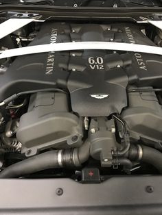 the engine compartment of a car with its hood open