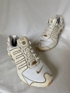 the shoes I am selling are second-hand and vintage, so they aren't new! nike shox 2007 white gold size: eu 39 cm 25 the best option to check the size is always centimeters, size numbers vary from company to company. condition: very good, with common signs of wear (discolored salt, wreckles on leather and scratches) flaws: these dont have insole (you have to buy the right one for your shoe size available at any shoe stuff store) - after purchase, please text me your email and telephone number (th Vintage White Sneakers With Cushioned Footbed, Gold Air Max Sneakers For Streetwear, Gold Sneakers With Air Max Cushioning For Streetwear, Casual Gold Sneakers With Air Max Cushioning, Gold Casual Sneakers With Air Max Cushioning, Gold Sports Sneakers With Laces, Gold Sporty Running Sneakers, Gold Low-top Running Sneakers, Nike Vintage Shoes