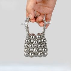 Mini Silver Beads Shoulder Bag Silver Metal Shoulder Bag For Party, Trendy Silver Evening Bag With Phone Holder, Silver Metal Rectangular Bag, Trendy Beaded Evening Bag, Silver Metal Evening Bag As Gift, Trendy Handheld Beaded Evening Bag, Silver Beaded Bag As A Gift, Silver Beaded Bags As Gift, Silver Beaded Bags Suitable For Gifts