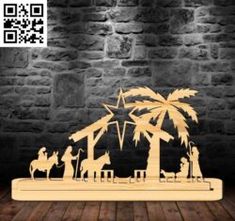 laser cut nativity scene with palm tree and three wise men in the manger