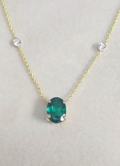 Perfect Emerald Diamonds Necklace for Wife to Be 7 x 5 mm Oval Pendant 14k Gold, Anniversary Necklace, Gold Necklace Gift, Wedding Necklace, Necklace for Bride. Setting Options (Choose & Checkout) White, rose or yellow Gold 14k or 18k Center Stone:  Emerald Chatham 7.00 x 5.00 mm  Carat weight 0.70 Color Green Clarity VS Cut Excellent  Side Diamond: 2 Diamond 0.10 Carat D VS1 Why ∙ It's ∙ Awesome ✓ Gemological Certificate  ✓ 20 Years of Experience ✓ 100% Original Designs ✓ Conflict-Free Diamonds Classic Oval Emerald Necklace For May Birthstone, Classic Oval Emerald Necklace With Prong Setting, Classic Oval Emerald Birthstone Necklace, Oval Diamond Cut Emerald Necklace For Anniversary, Oval Diamond Cut Emerald Necklace Fine Jewelry, Oval Diamond Cut Emerald Necklace, Elegant Oval Emerald Necklace, Classic Oval Emerald Necklace In Yellow Gold, Classic Oval Emerald Necklace