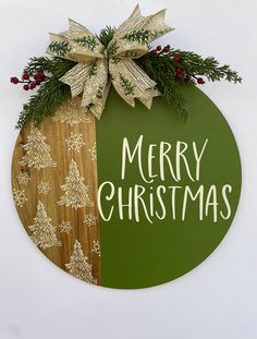 This classic farmhouse Merry Christmas door hanger or wall decor would be a beautiful addition to your Christmas decorations.  This sign measures 18"x18".  This would be wonderful for a housewarming, teacher, or hostess gift.  If you would like me to add a card I would be more than happy to. Just leave your message when you place your order.                                          Thank you for visiting my shop!    Please Like and Follow my Facebook and Instagram pages.  You will get updates on new items I will continue to add. There will be something for every season or everyday reason.                                 -Suzanne.                                                 Wreath365 Joy Door Hanger Christmas, Christmas Door Plaques, Farmhouse Christmas Door Hangers, Christmas Front Door Sign, Round Christmas Signs, Christmas Door Signs, Wooden Christmas Signs, Hanger Christmas Wreath, Door Hanger Christmas