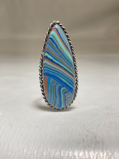 "Rainbow Casilica Ring sterling silver women girls Size 6.75 Weight 7.4g Length 1. 3/4\" Width. 3/4\" Thinnest part of band 1/8\" Free Shipping & Free Postal Insurance Delivered in a Gift Box If you do not want the ring polished and want to leave the natural patina please let me know at the time of purchase as I do polish rings before I ship rings out. Thanks USPS Domestic Shipping is free for buyers. If a buyer prefers to upgrade to priority, the buyer will pay that portion of the shipping Southwestern Sterling Silver Teardrop Ring, Adjustable Sterling Silver Multi-stone Rings, Adjustable Multi-stone Sterling Silver Rings, Adjustable Multi-stone Turquoise Ring In Silver, Adjustable Multi-stone Silver Turquoise Ring, Adjustable Silver Turquoise Multi-stone Ring, Collectible Blue Rings, Sterling Silver Turquoise Ring Collectible, Sterling Silver Turquoise Ring For Collectors