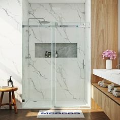 a bathroom with marbled walls and flooring, including a walk - in shower