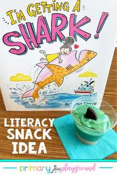 a shark book with a green drink in it and the title i'm getting a shark