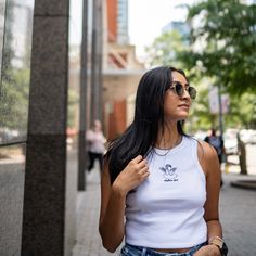 This trendy & unique Angel Energy Sorority Bella Canvas Embroidered Cropped Tank Top is sure to stand out on any campus! These tanks are perfect for big/little reveal, work-week fits, or bid day celebrations Picture Details ⭑ #1-4: White tank, Black thread (Alpha Phi) Care Instructions ⭑ Wash inside out on cold & air dry for best results ⭑ Do not dry clean ⭑ Light iron if necessary ⭑ Care instructions are included with every order. We are not responsible for damages if not cared for properly. Ta Casual Tops With Custom Embroidery For College, Trendy Tops With Embroidered Logo, Trendy Custom Embroidery Tops For Streetwear, Casual Fitted Top With Custom Embroidery, Embroidered Text College Tops, Trendy Top With Custom Embroidery For Spring, Trendy Tops With Custom Embroidery For Spring, Spring Streetwear Tops With Custom Embroidery, Work Week Outfits