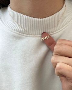 In celebration of all the great mothers around the world, treat the mom in your life to this piece of jewelry they deserve with this gold mama necklace. A perfect way to express what means most to you! Available in 14K yellow, rose or white gold Letters measure about 5mm in height Necklace total length is measured from end to end Dainty minimalist everyday necklace Mama Letter Necklace, Mother's Day Pendant Charm Necklace, Everyday Pendant Charm Necklace For Mother's Day, Everyday Pendant Charm Necklaces For Mother's Day, Gold Name Necklace For Everyday Wear, Everyday Gold Name Necklace, Rose Gold Charm Necklace Gift For Mom, Dainty 14k Gold Name Necklace For Mom, Everyday 14k Gold Necklace For Mother's Day