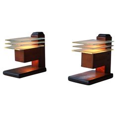 pair of modern wooden and glass table lamps