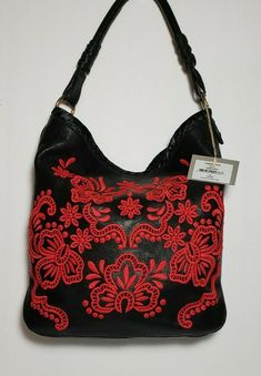 NWT ISABELLA FIORE VICTORIAN FEEL EMBROIDERED RED AND BLACK LARGE HOBO EMBROIDERED STUDDED SHOPPER TOTE $425 BRAND NEW WITH TAGS IS A STUNNINGLY BEAUTIFUL DESIGNER HOBO BAG. ISABELLA FIORE VICTORIA TOTE, RED EMBROIDERY ON A BLACK BASE,THIS SATIN HANDWHIP STICHED TOP RIM . LARGE MAGNETIC CLOSE REAR POCKET BRASS HARDWEAR ACCENTS 2 INSIDE POUCHS AND ZIPPERED SIDEWALL COMPARTMENT. MEASURES APPROX. 12” HIGH x 12” ACROSS x 4” DEEP AND APPROX 11” SHOULDER STRAP DROP. 13 WITH SLOUCH CONDITION IS NEW WIT Designer Hobo Shoulder Bag For Shopping, Designer Hobo Bag With Removable Pouch For Shopping, Designer Hobo Bag With Double Handle For Errands, Designer Double Handle Hobo Bag For Errands, Designer Hobo Bag With Removable Pouch, Spring Leather Shopping Bags, Designer Embroidered Bags For Daily Use, Leather Hobo Bag With Detachable Handle For Spring, Spring Leather Shoulder Bag For Shopping