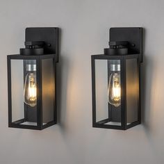 two wall lights with one light on each side and the other on the opposite side