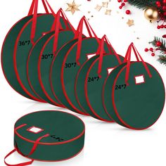 six green round christmas tree skirts with red ribbon on them and decorations in the background