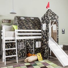 a bunk bed with a slide next to it