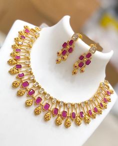 Unique design Matte gold finish necklace studded with American diamond color stones.  Necklace comes with matching pair of earrings. South Indian Wedding Jewelry, Ad Stone Necklace, White Stone Necklace, Jewelry Set Gold, Indian Wedding Jewelry Sets, Stone Necklace Set, American Diamond Necklaces, Wedding Jewelry Set, Indian Necklace