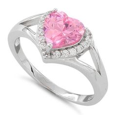 Top of ring height: 9.1mm

Top of ring width: 9.1mm

Band width: 5.6mm

Shank width: 1.7mm


Stone material: pink & clear cubic zirconia

Center stone size: 7mm x 7mm

Stone shape: heart shape (center) & round

Center stone carat weight: 1.13 ct.

Total number of CZ stones: 17

Stone setting: Prong setting


Metal: 925 sterling silver

Plating: rhodium plated

Finish: high polish Heart Halo Ring, Pink Heart Rings, Split Shank Ring, Silver Heart Ring, Pretty Rings, Pink Ring, Ring Promise, Ring Engagement, Sterling Silver Heart