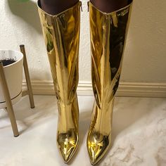 Brand New Gold Boots Mid-Calf Inward Zipper Closure 4 Inch Heel Gold Knee-high Boots For Fall, Gold Boots With Round Toe And Medium Width, Gold Heeled Boots With Reinforced Heel For Fall, Gold Boots With Reinforced Heel And Round Toe, Chic Gold Knee-high Heeled Boots, Gold Boots For Spring Evening, Gold Evening Boots For Spring, Gold Ankle-high Boots With Reinforced Heel, Glamorous Gold Leather Boots