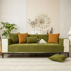 a living room filled with furniture and decor on top of a white carpeted floor