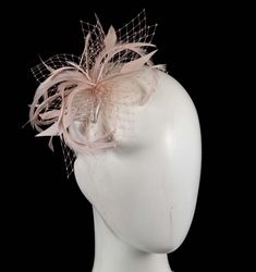 This stunning pink fascinator is hand made by best Melbourne millinery and is mounted on a comb. Our fascinators look great on you for that special occasion like wedding, Melbourne Cup or Ascot.  Made in Australia  Any color is possible -- please ask us  Comb for easy wear Elegant Pink Hair Accessories For Royal Ascot, Pink Headband Fascinator For Evening, Pink Evening Fascinator Headband, Elegant Pink Fascinator For Event, Elegant Pink Headband Fascinator, Elegant Pink Fascinator For Events, Elegant Pink Hair Accessories For Kentucky Derby, Elegant Blush Fascinator For Party, Elegant Pink Wedding Headband